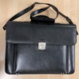 An unbranded laptop case with zipped compartment and adjustable strap with silver-tone hardware