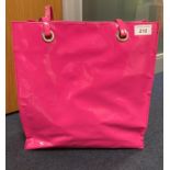 Hot pink Bulaggi tote bag with branded interior lining and zipped pocket (saleroom location: T11)