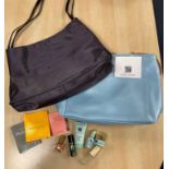 Estee Lauder sets including, two tote bags and matching small purse/makeup bag (for the purple bag),