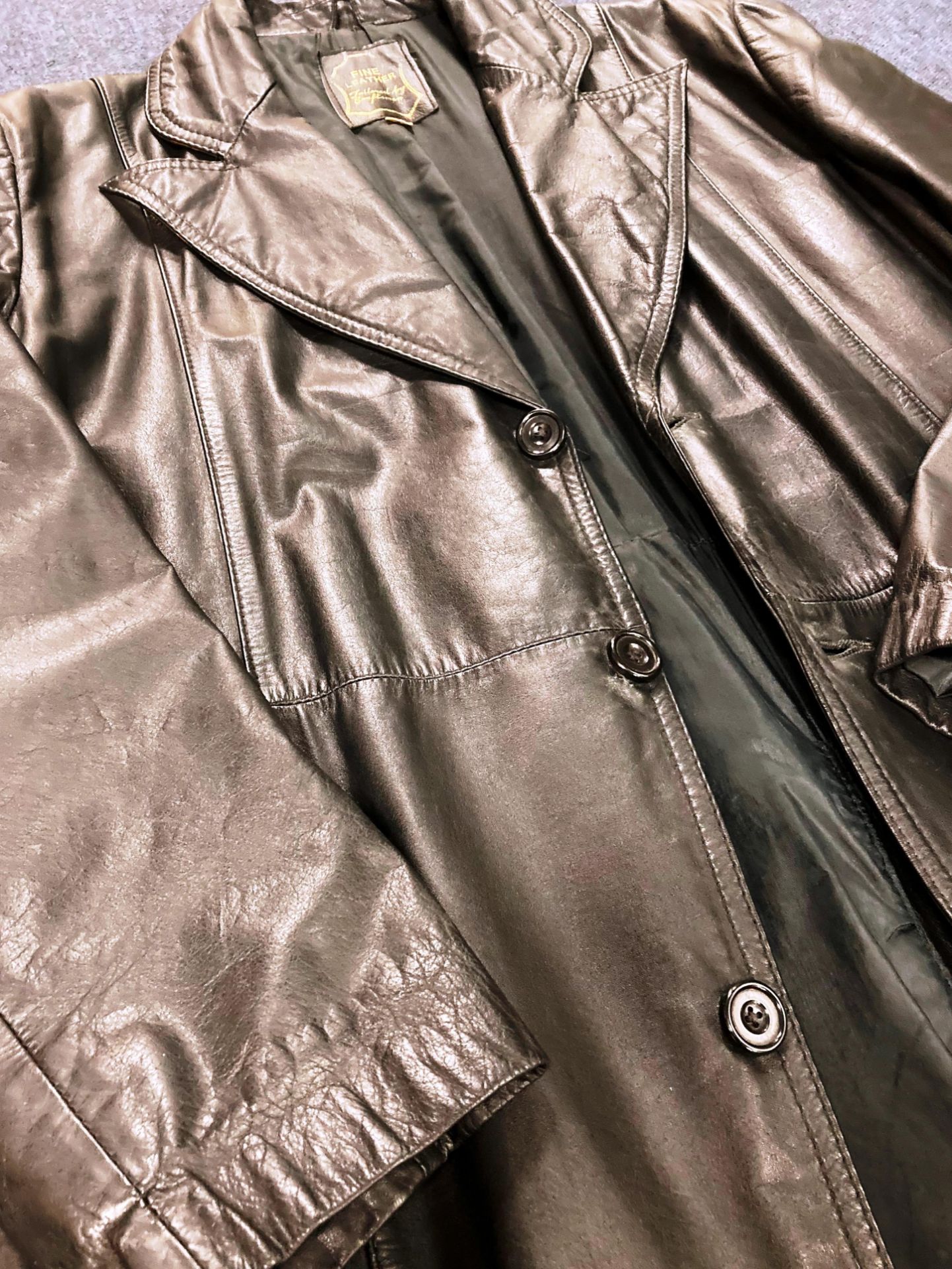 A fine leather, 'tailored by craftsmen' leather trench coat with button fastenings, - Image 2 of 3