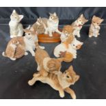 Red lid containing seven Country Artists cats 5 to 8cm high (saleroom location: X11)