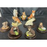 Brown box containing nine animals - eight by Country Artists 4 to 10cm high and fox by Border Fine