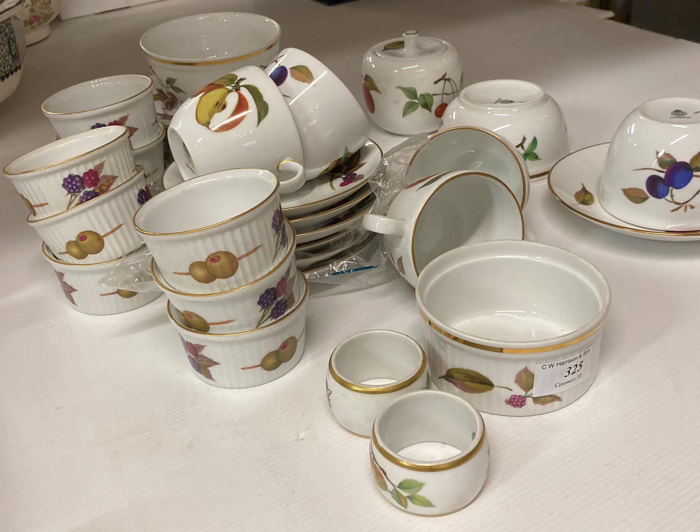 Thirty-five pieces of Royal Worcester Evesham porcelain tea service - cups, saucers,
