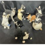 Grey lid containing seven Country Artists cats 7 to 12cm high (saleroom location: X11)