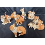 Black lid containing seven Country Artists cats 5 to 9cm high (saleroom location: X11)
