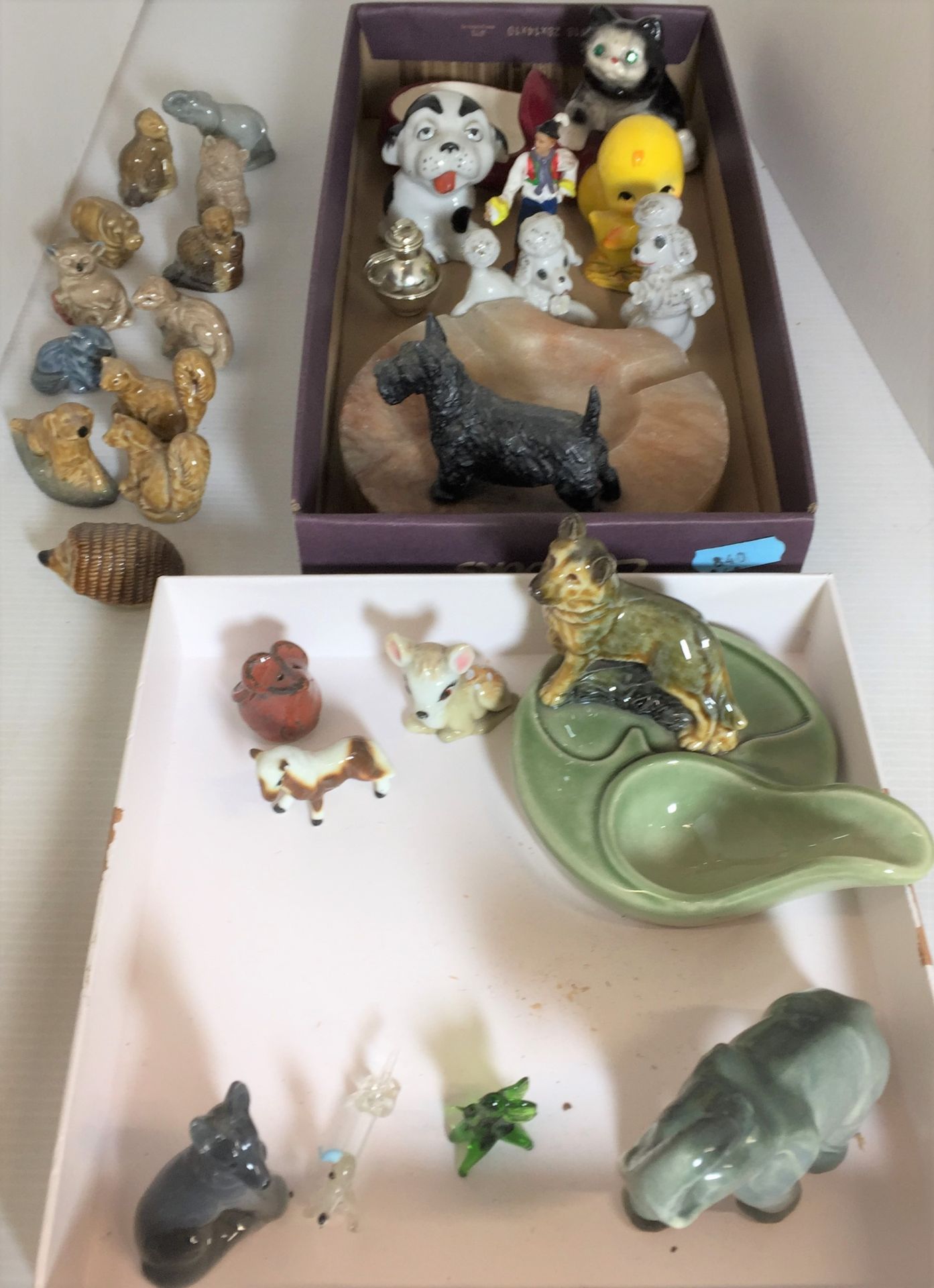 Contents to two lids - twenty five plus items including twelve Wade miniature animals and dog spoon