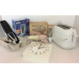 Four items - Tesco 2 T04W toaster, Braun 4775 shaver with original packaging,