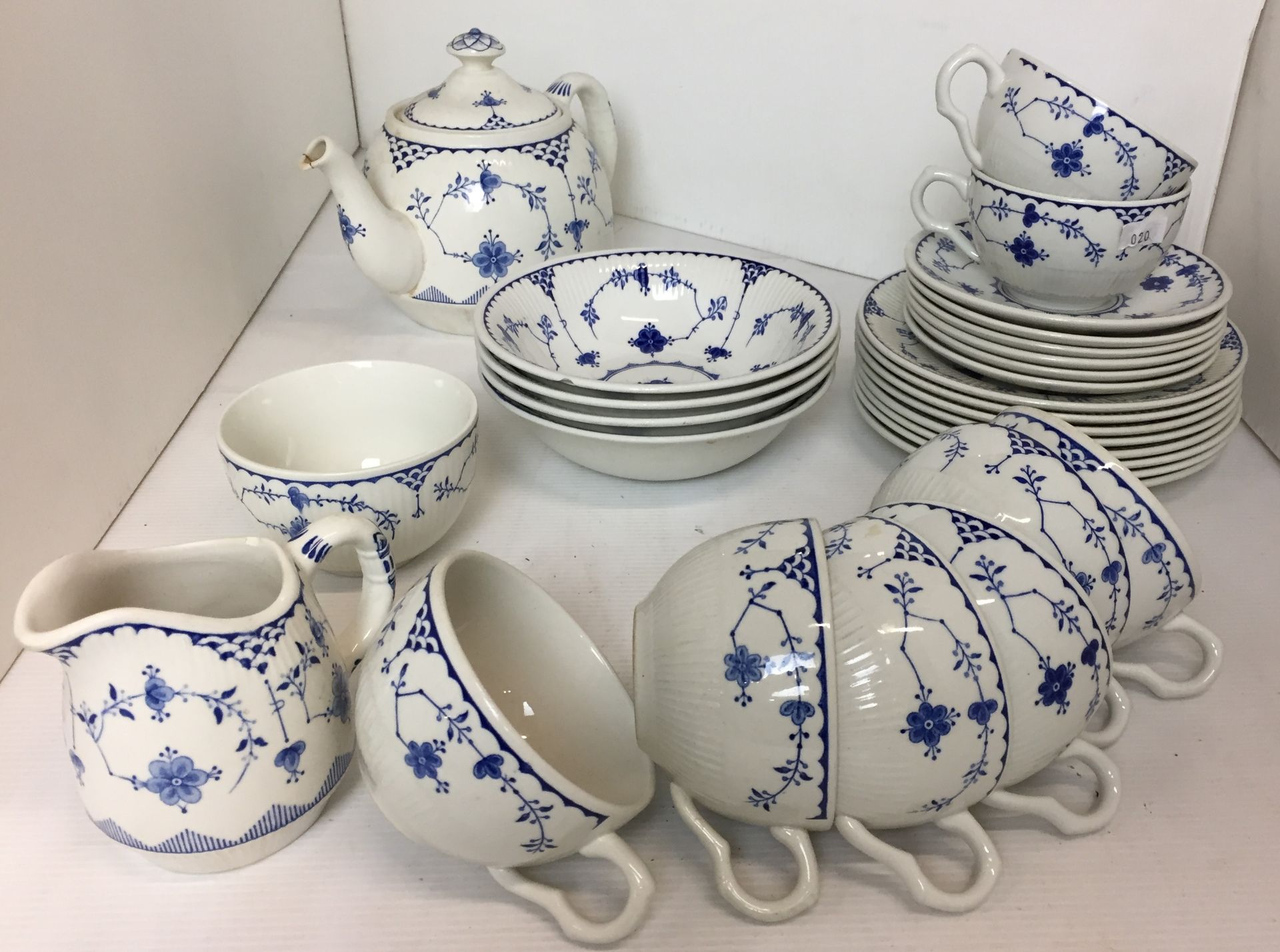 Twenty nine pieces of Masons and Furnivals Denmark blue and white tea service including teapot