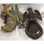 Three door knockers including two brass - fish 13cm high and policeman 12cm high,