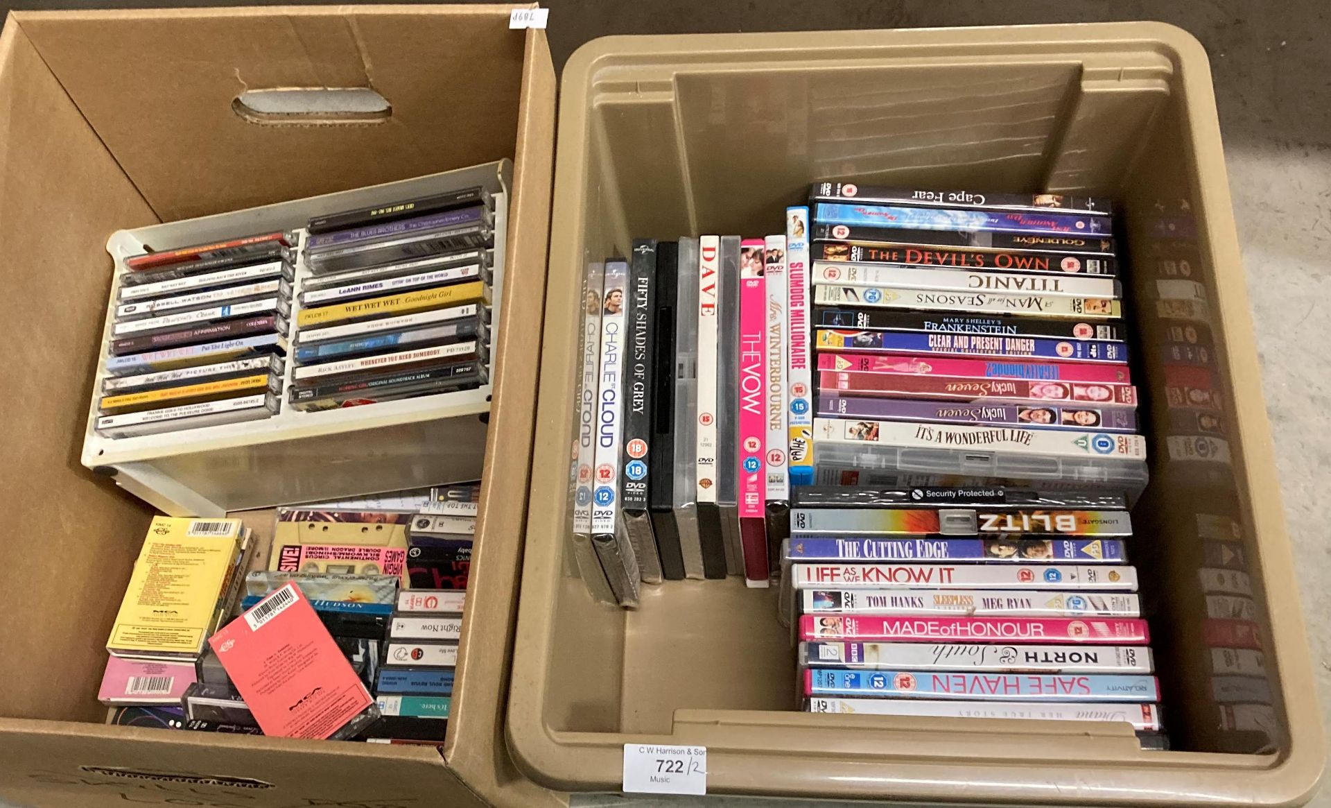 Contents to two boxes - a mixture of DVDs, CDs and cassette tapes,