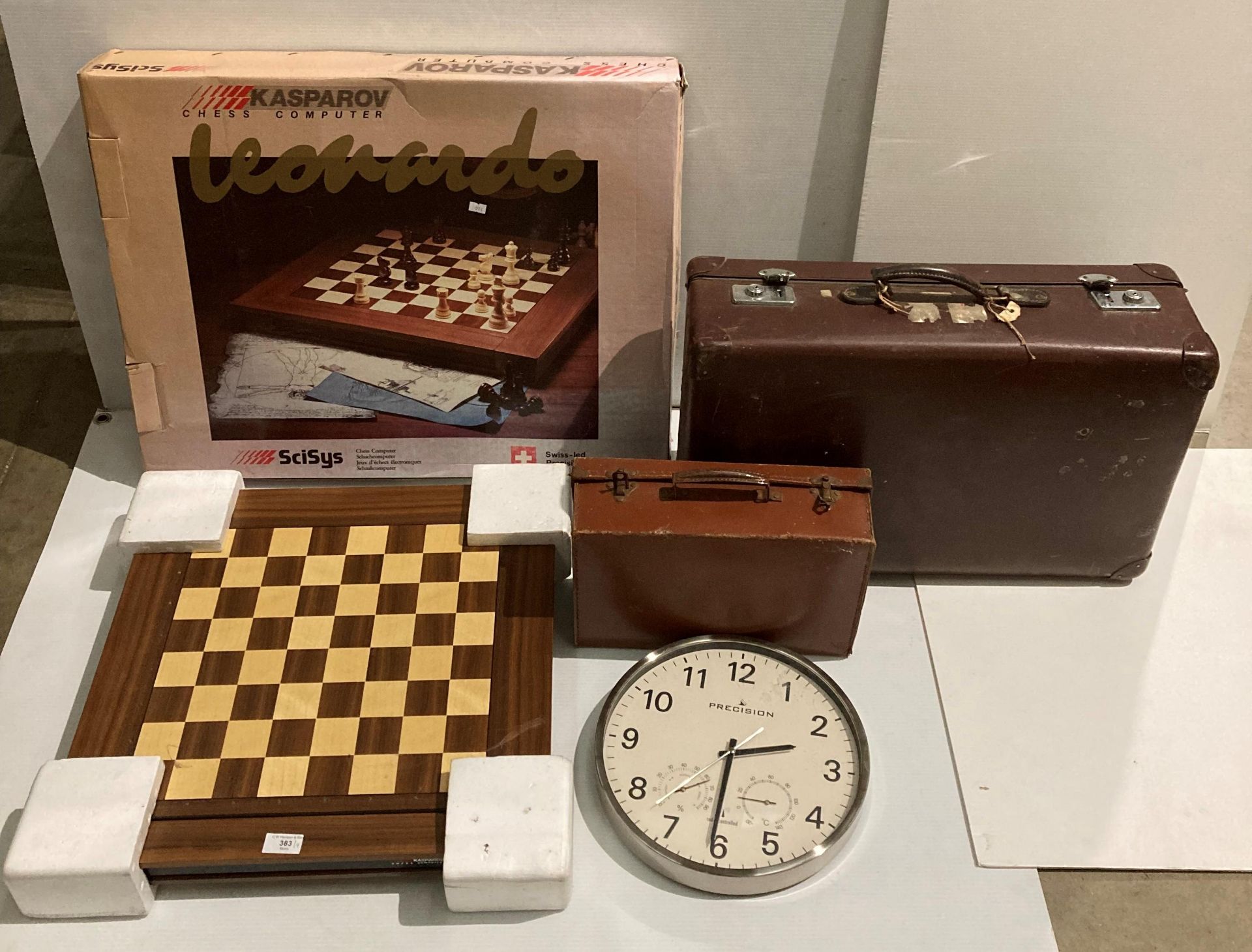 A SCISYS Leonardo Kasperov chess computer bound in box but no leads or pieces,