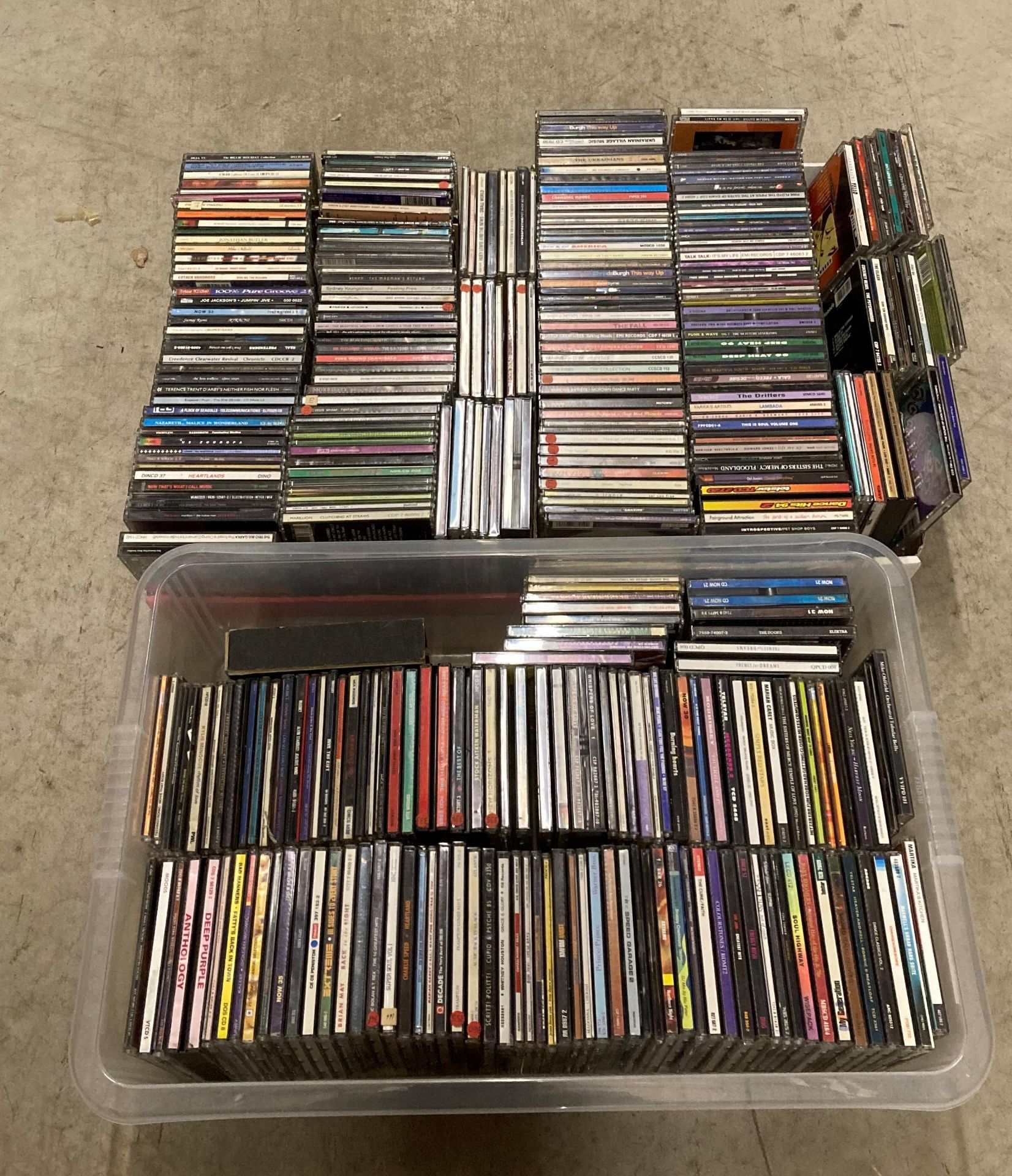 Approximately 330 assorted music CDs including singles and albums.