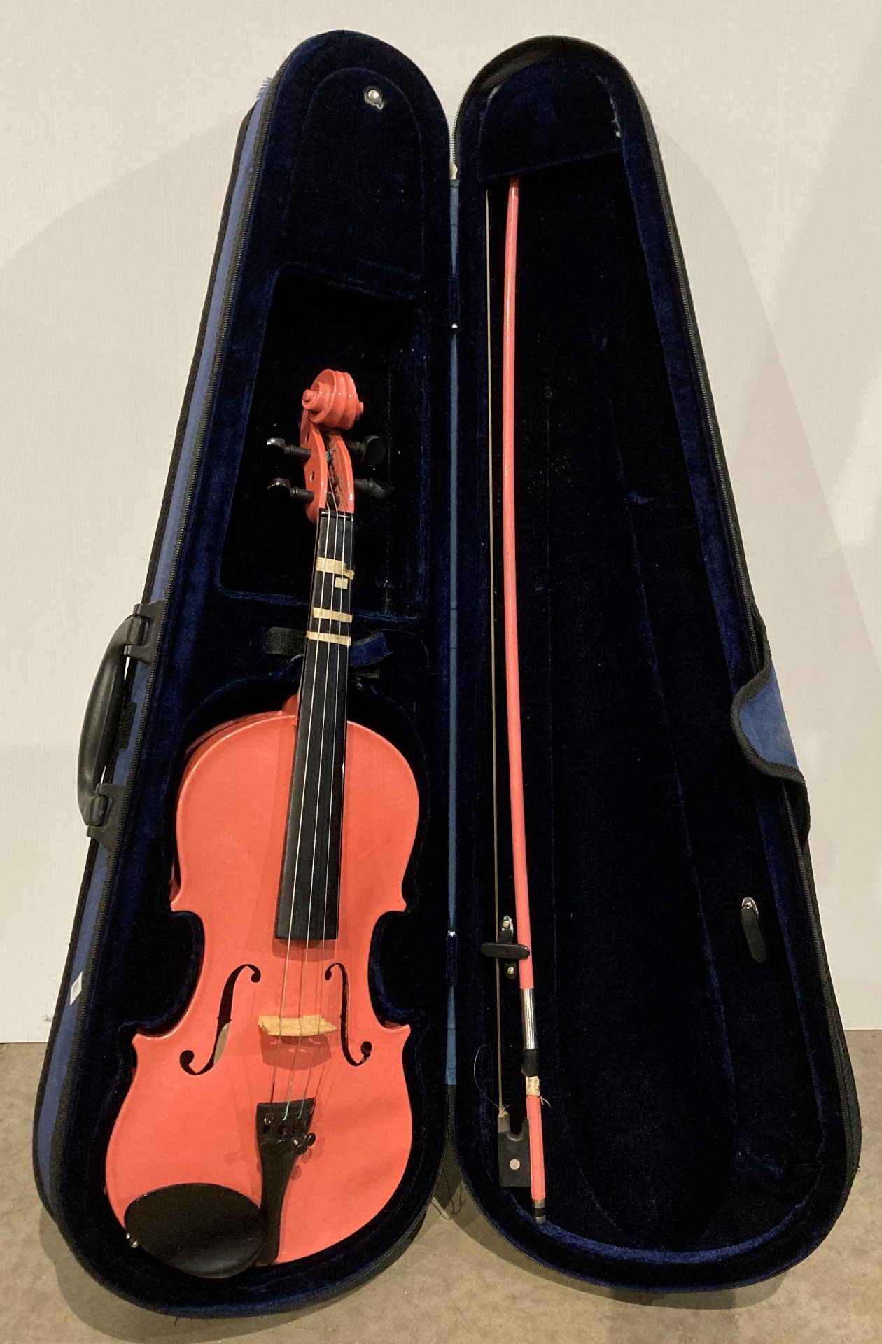 Interstudent learning violin in pink with bow in case (Saleroom location: S3)