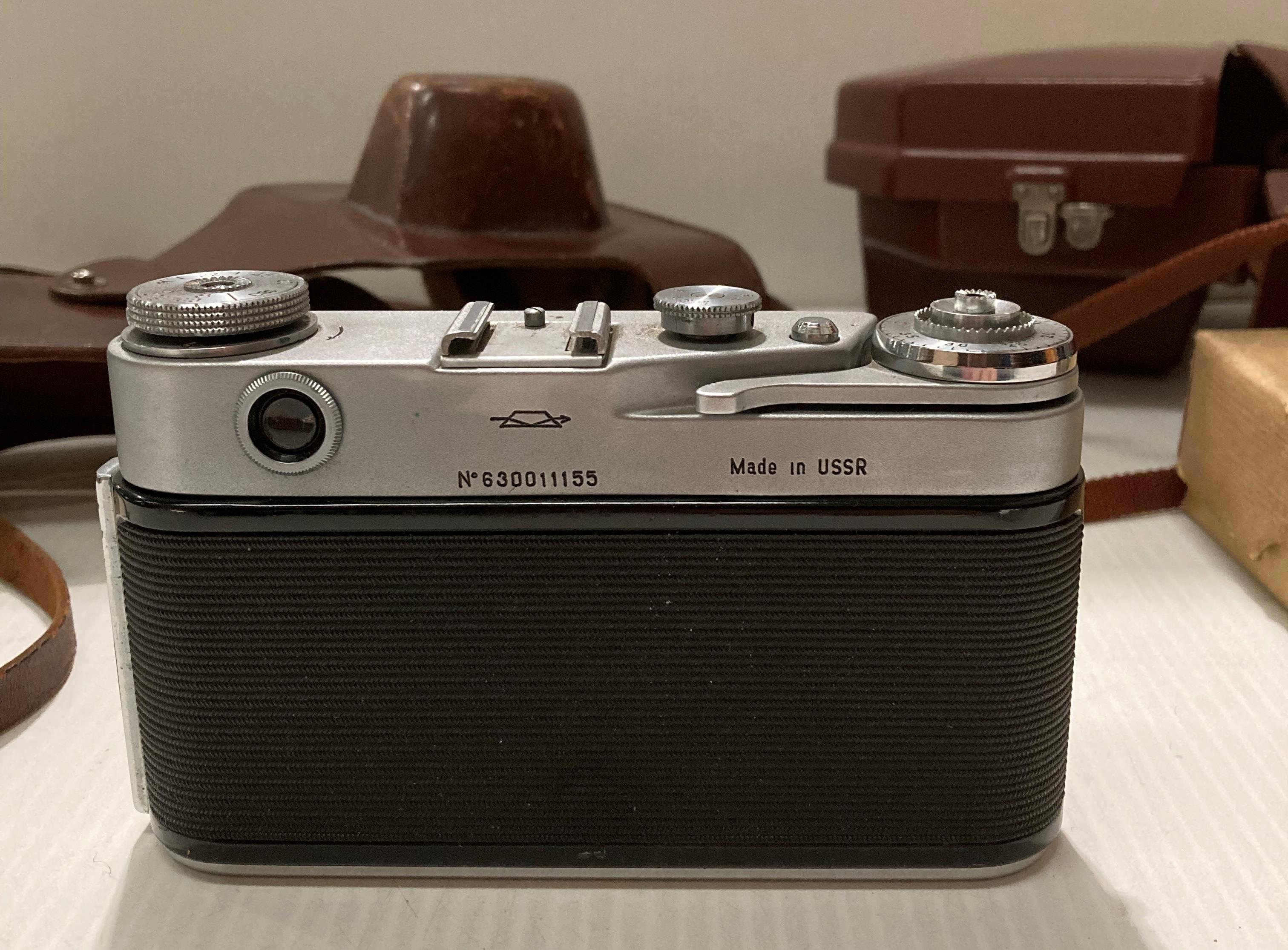 A Kodak Spool camera model 300m reflex F 1.6 in case, a 'Bolco' condenser lens and a Zorki 6 F 3. - Image 9 of 10