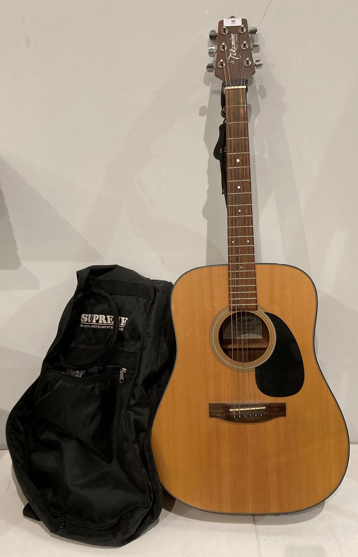 Takamine G series G320-NS acoustic guitar with a C071 Supreme standard gig bag (Saleroom location: