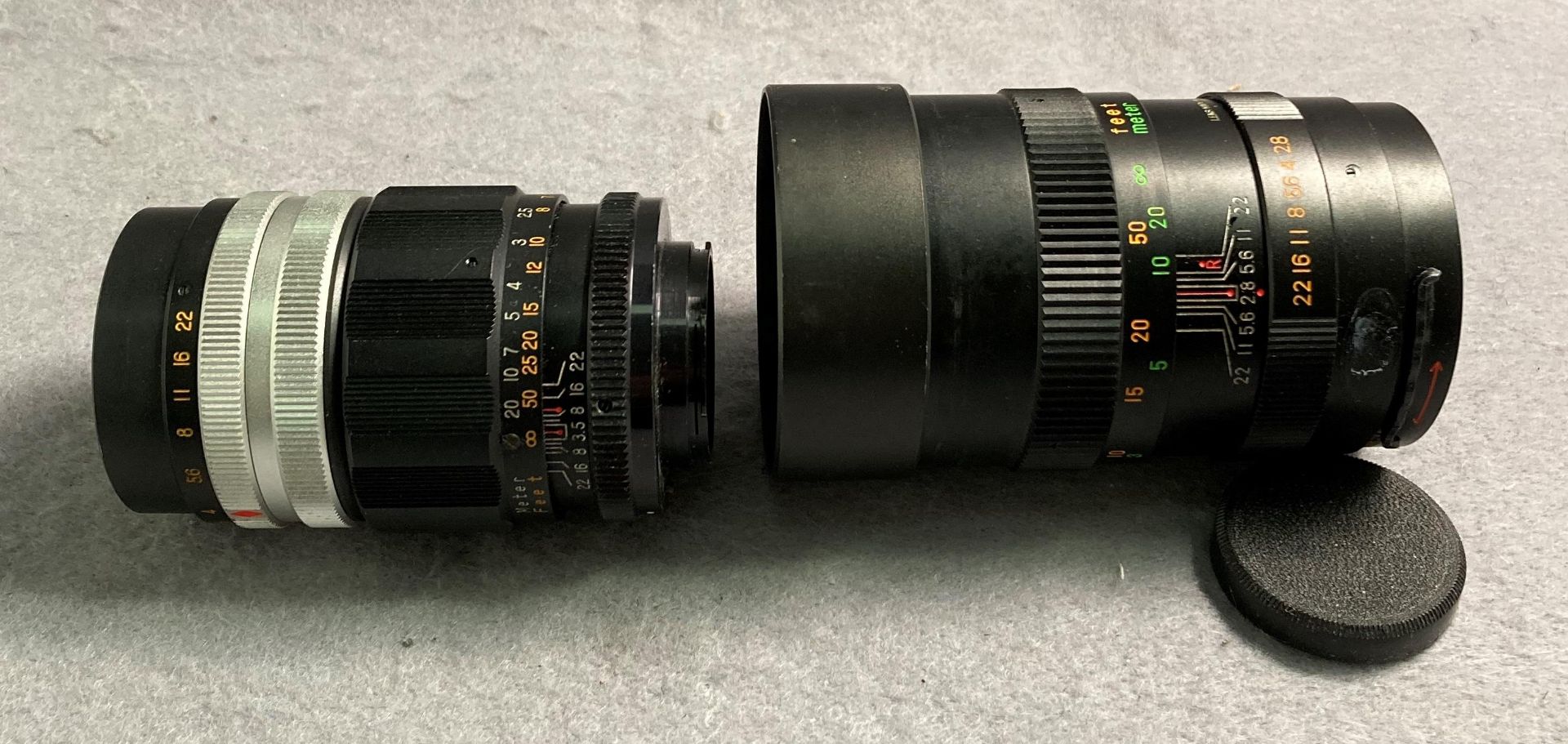 Two assorted camera lenses - Galaxy Telephoto 1:3.5 f=135mm no. H82262 and Sunomar Auto 1:2.