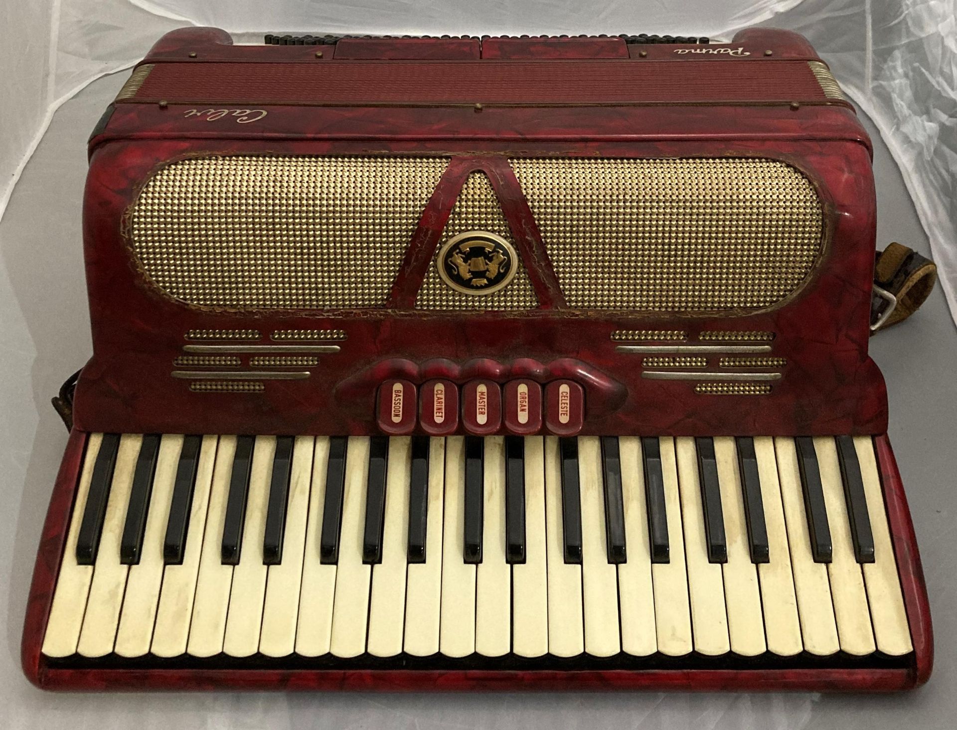 Calvi Parma vintage accordion in deep red in an original hard carrying case (Saleroom location: S3)