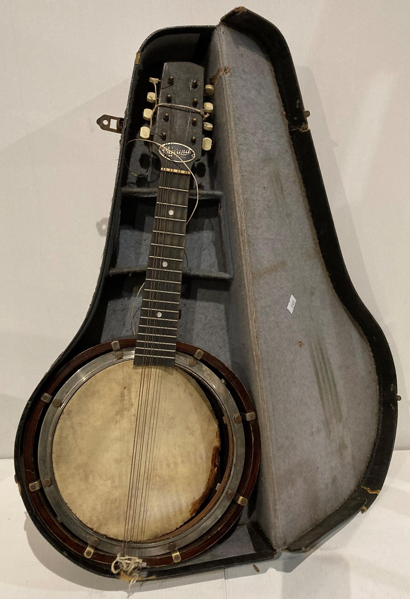 Vintage 'Savana' 8 string banjo (torn skin and missing one string) in case (Saleroom location: S3)