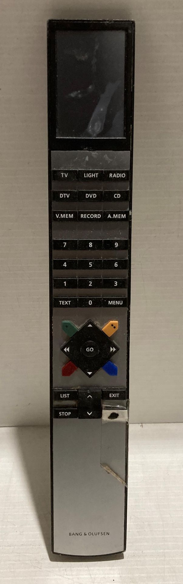 Bang & Olufsen remote control (cracked) together with leads and manuals (Saleroom location: S2) - Image 2 of 3