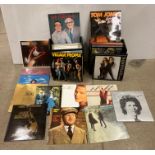 Contents to two black vinyl record cases - approximately fifty 12" vinyl records including Eagles,