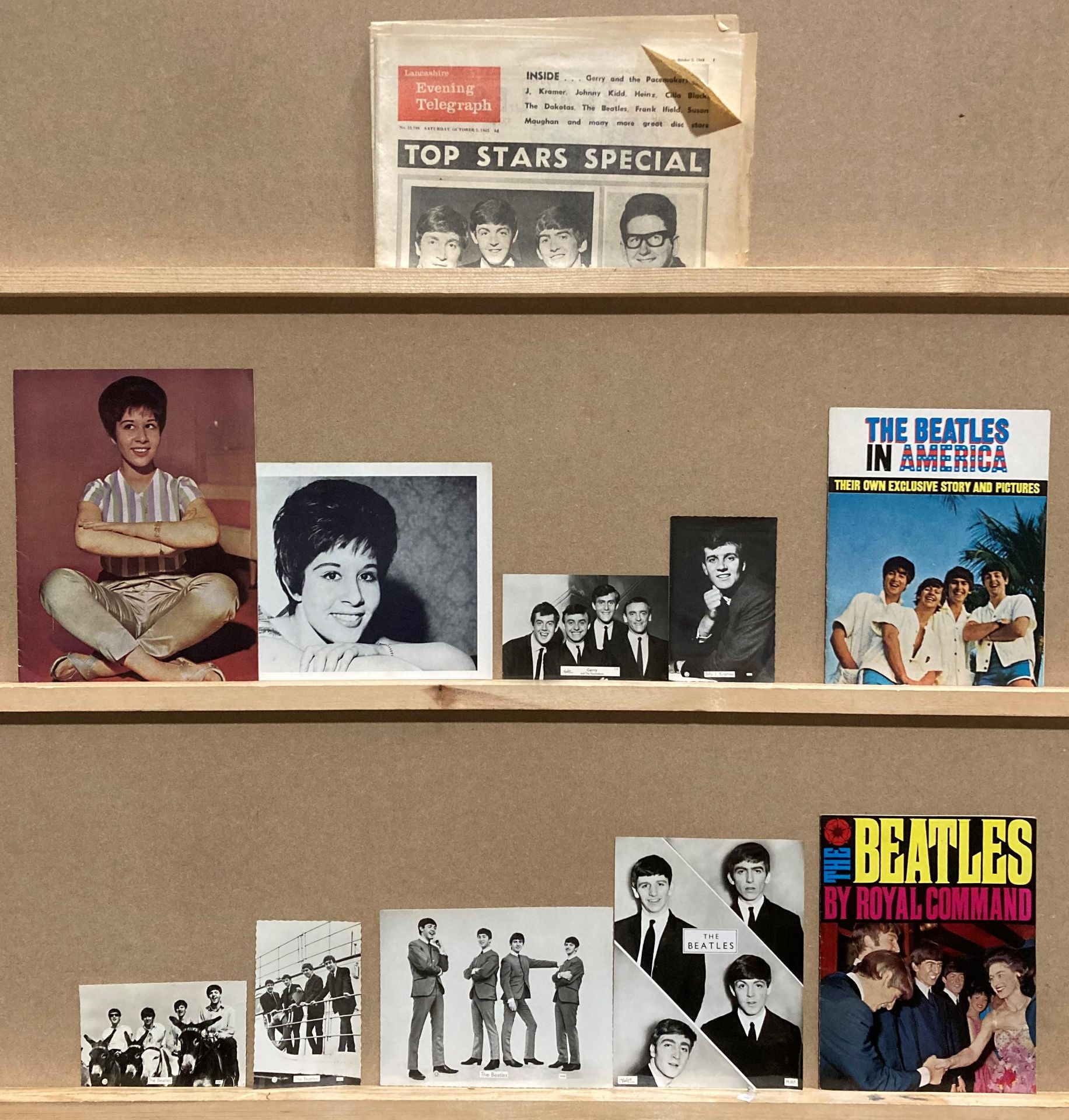 Four Beatles publicity photographs, two Beatles magazines,