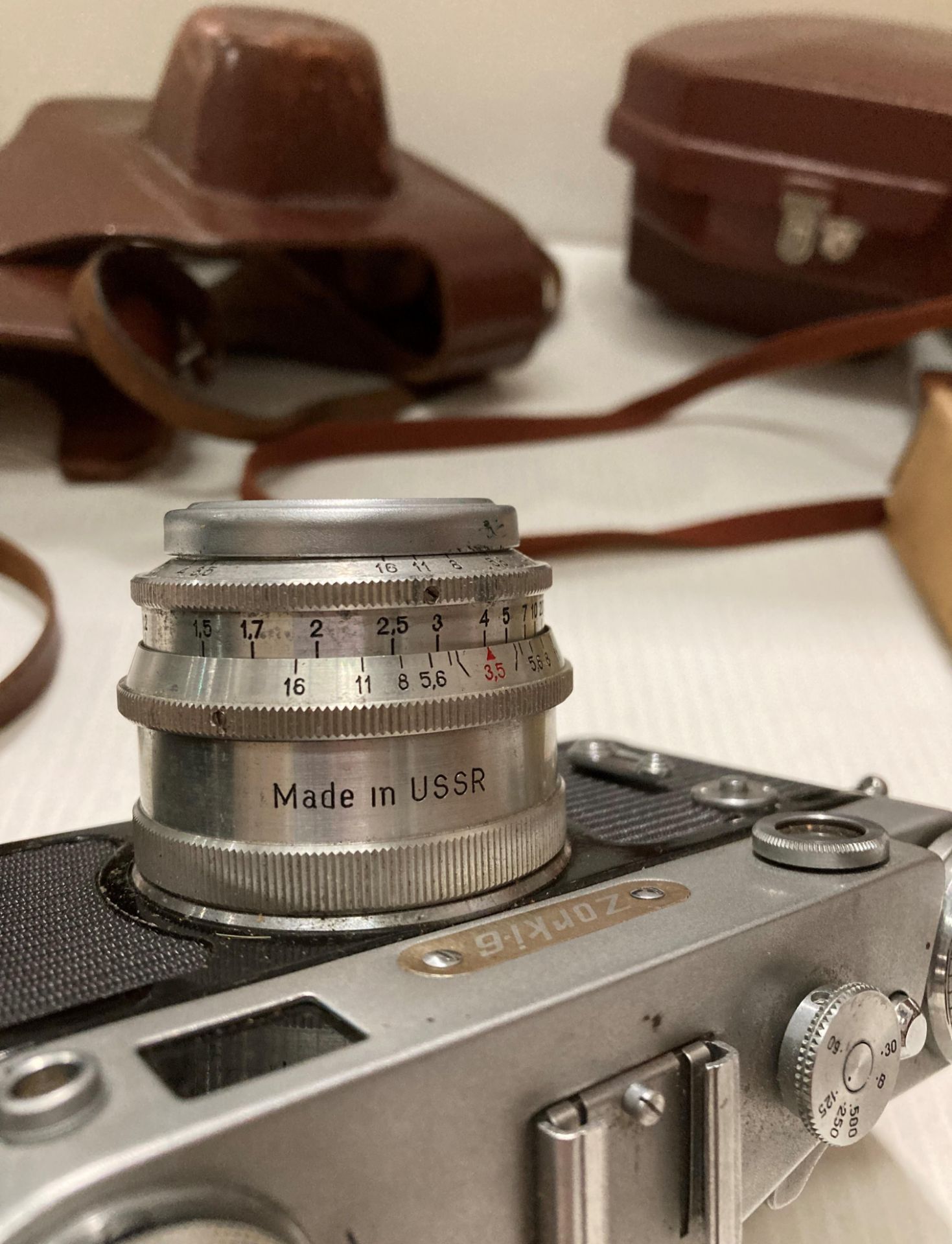 A Kodak Spool camera model 300m reflex F 1.6 in case, a 'Bolco' condenser lens and a Zorki 6 F 3. - Image 8 of 10