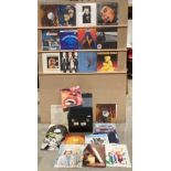 A black vinyl LP record case containing twenty-five LPs and twelve singles including The Police,