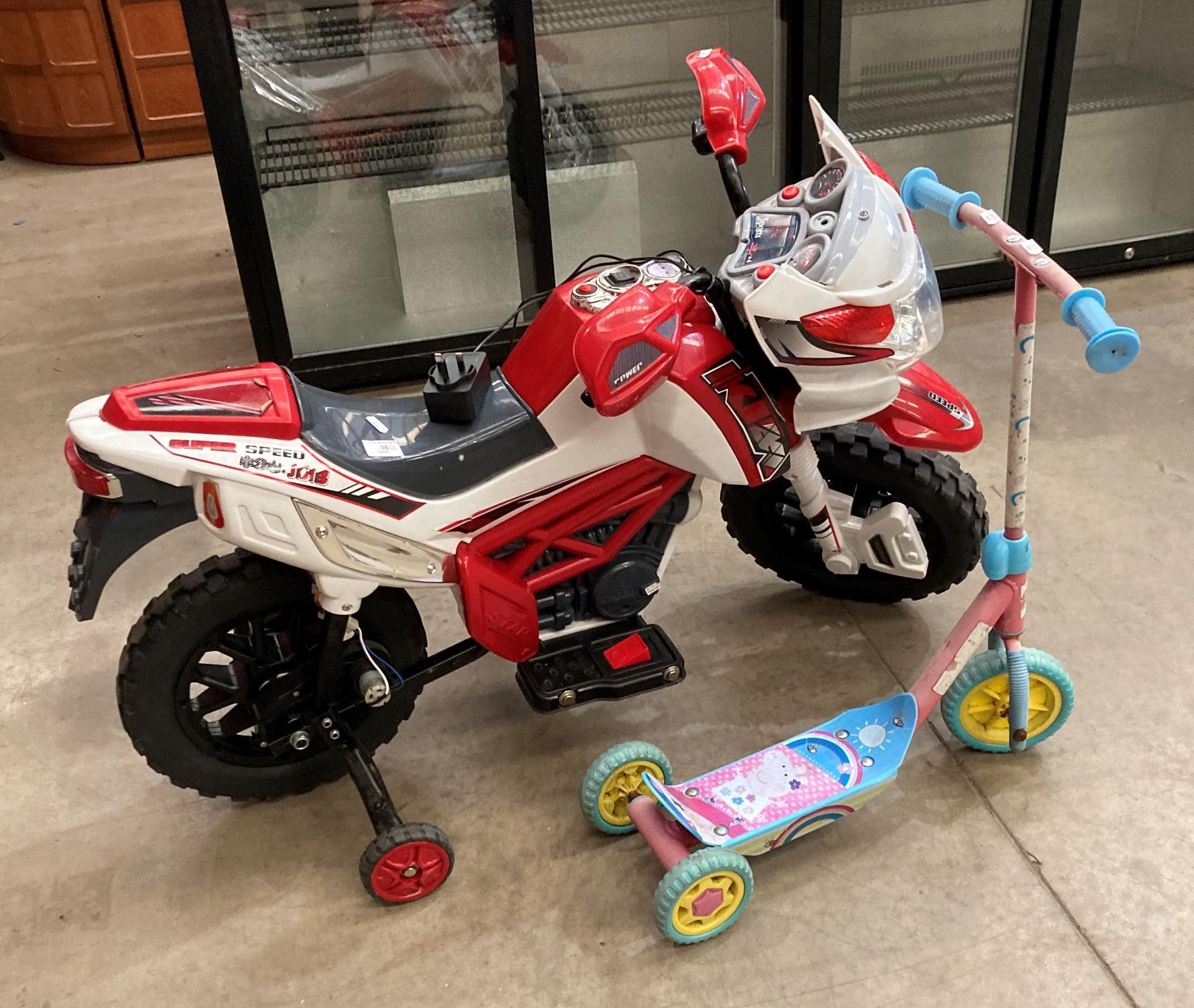 A child's sport SuperSpeed J513 - 240v bike with charger (does run) and a child's Peppa Pig scooter