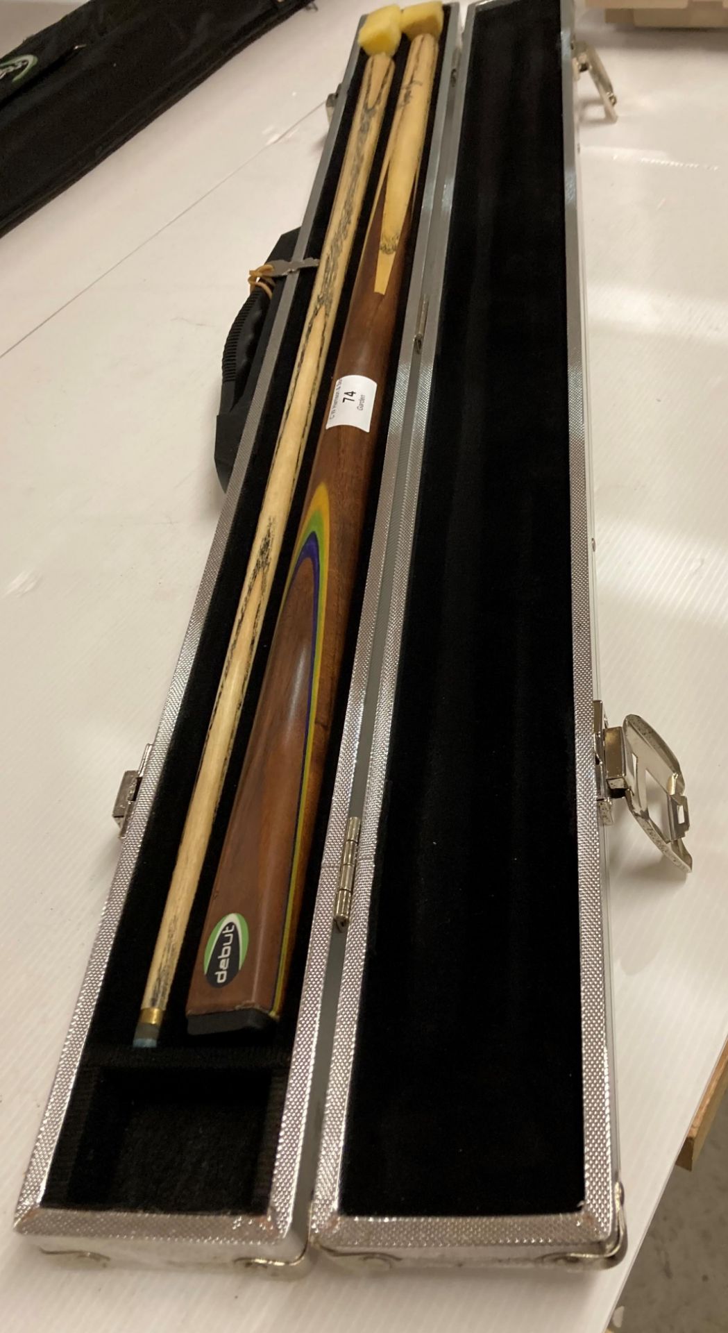 A Debut two-piece snooker cue with facsimile signature 'Stephen Maguire' in aluminium case