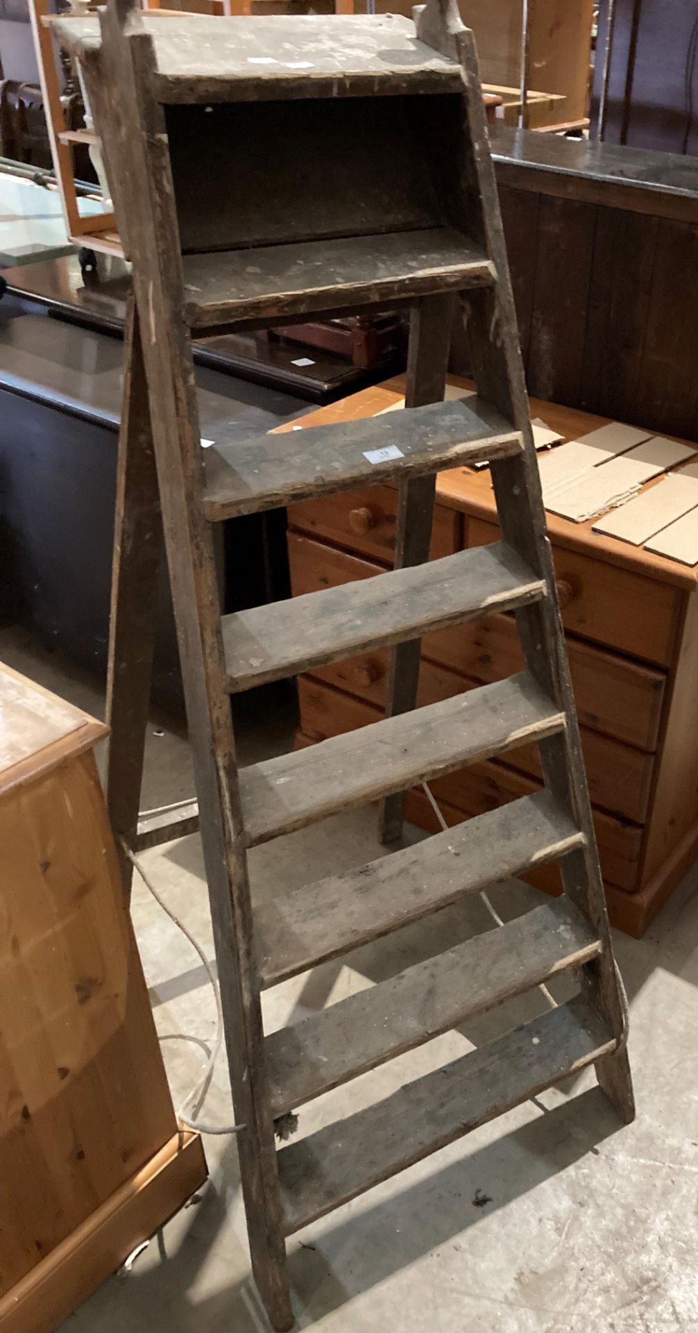 A pair of wooden eight-step step ladders (saleroom location: MWR01)