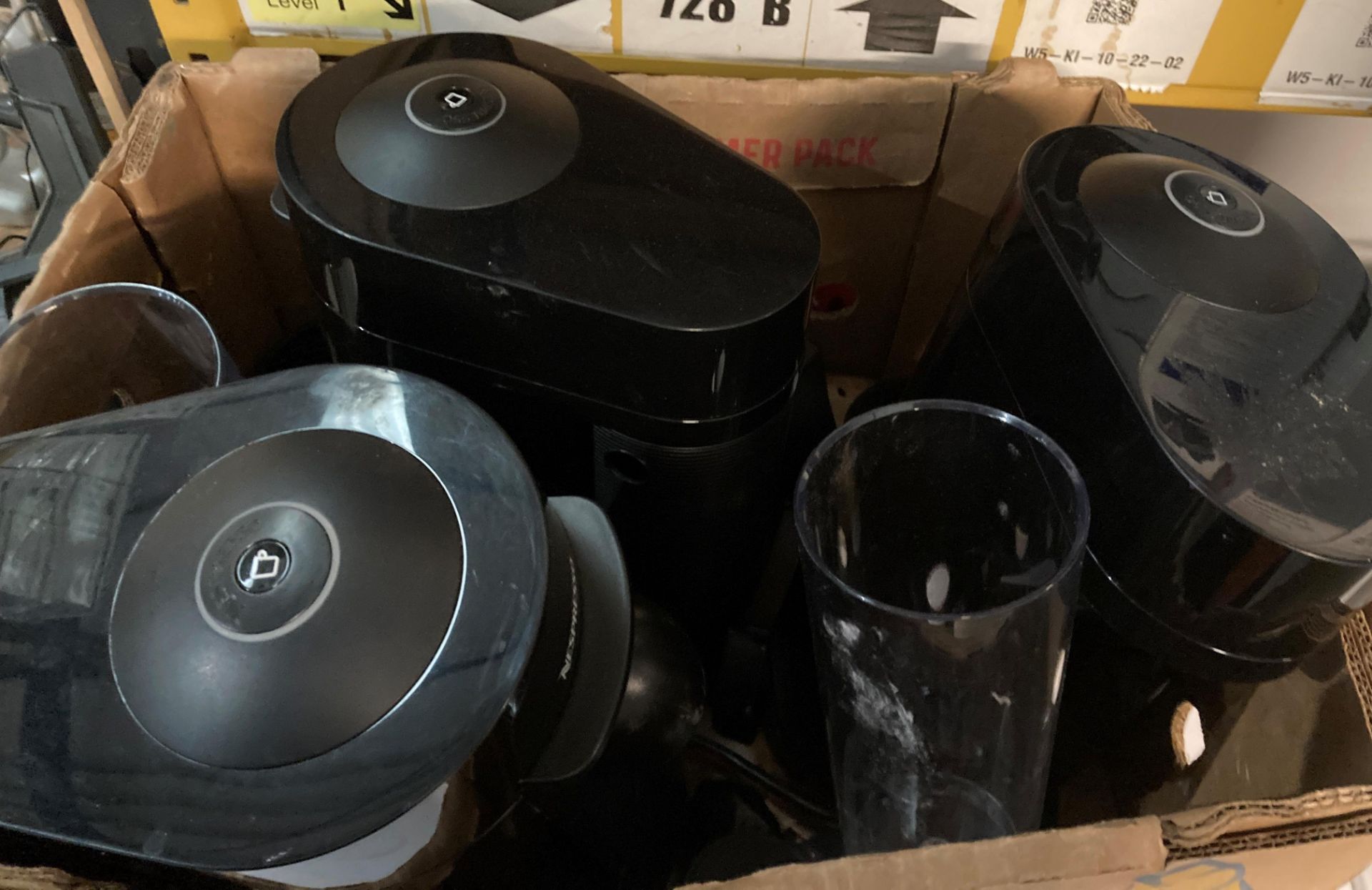 Contents to box - three Nespresso coffee makers - as viewed (saleroom location P0)