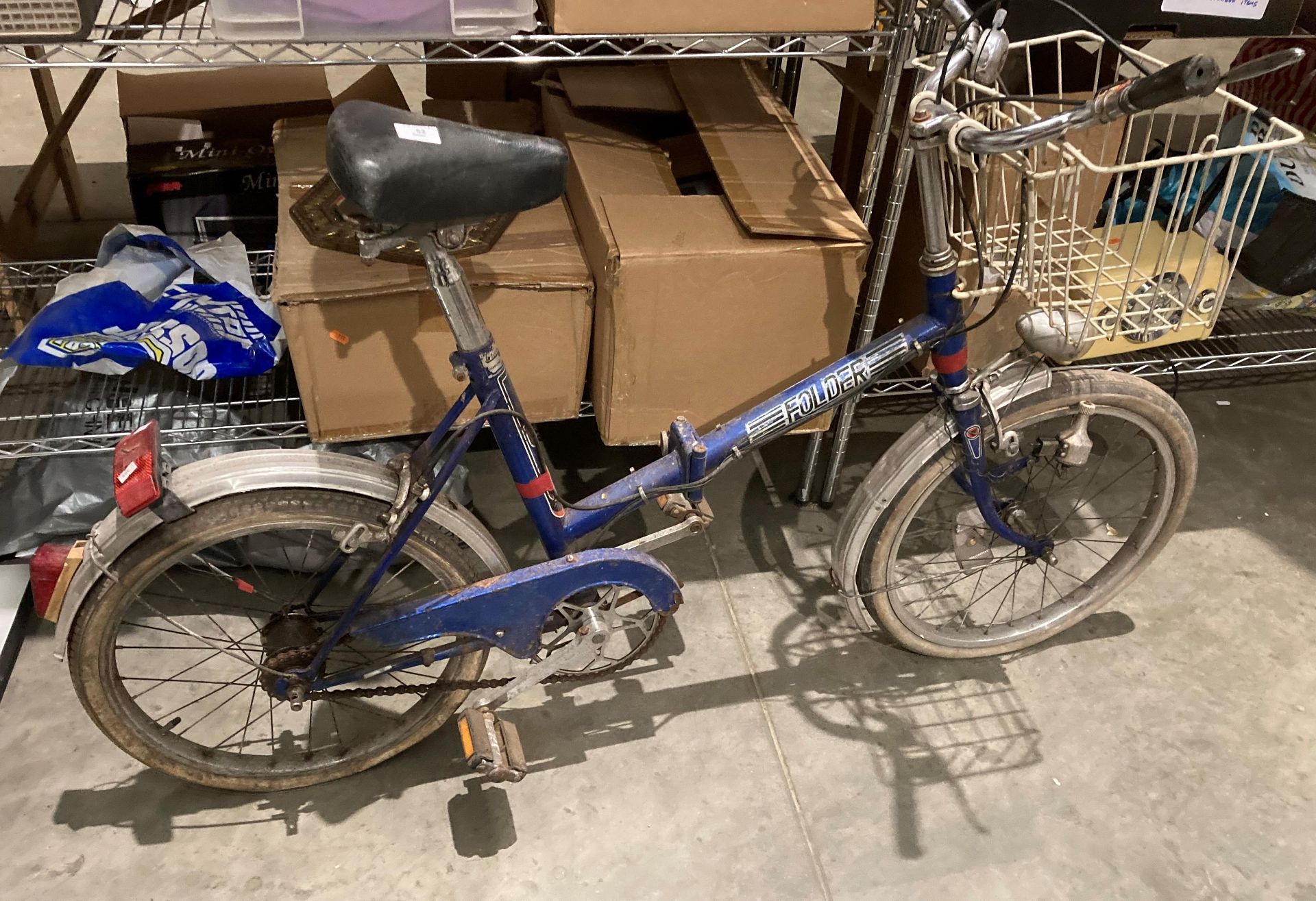 An Elswick Falco-Folding bicycle in blue - needs attention (saleroom location: S1)