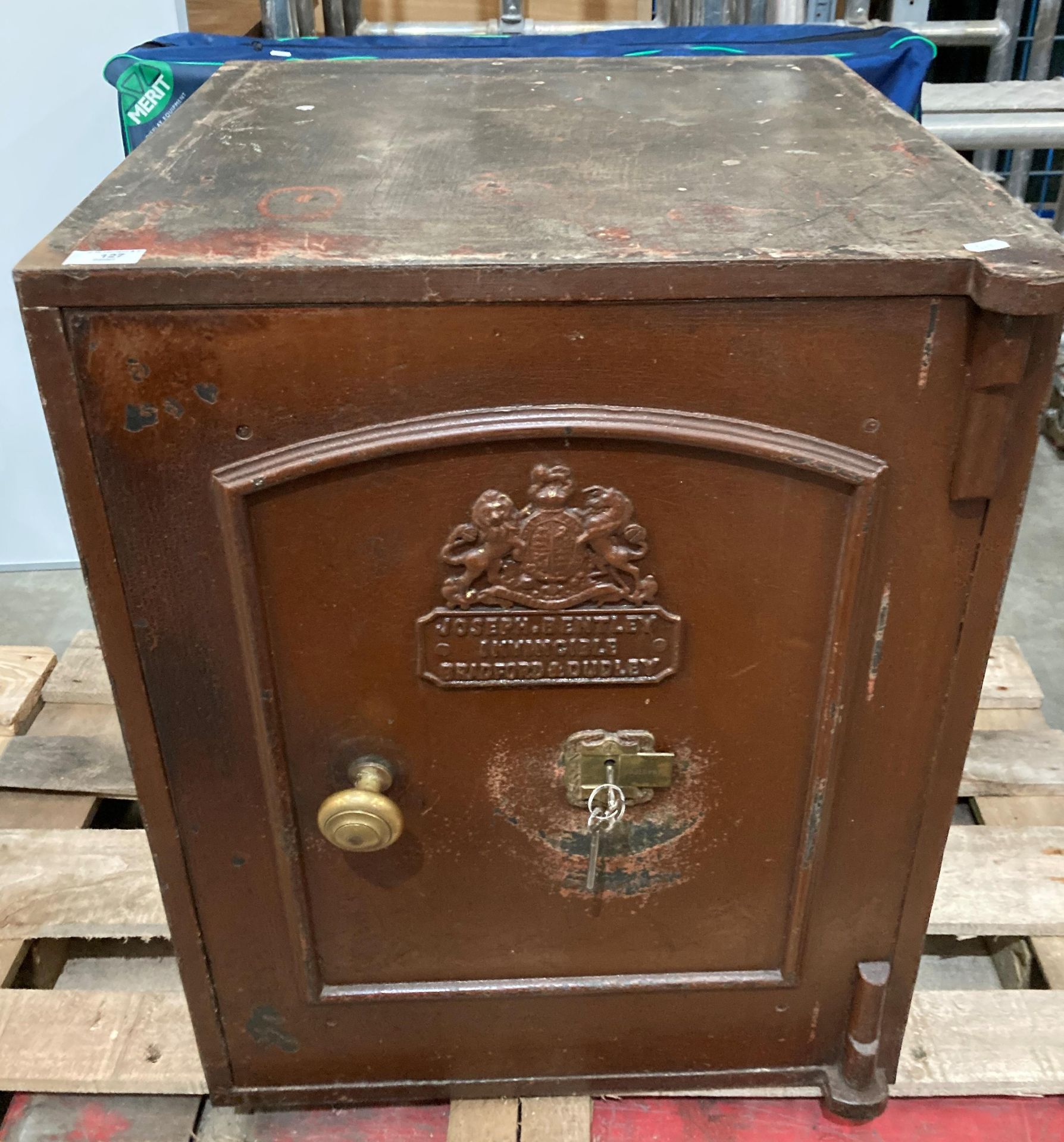 A Joseph Bentley Invincible Bradford and Dudley brown metal office safe,