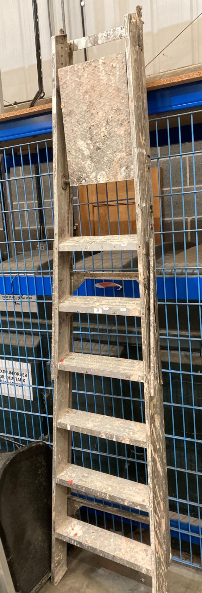 A pair of aluminium six-step step ladders (saleroom location: DT) - please note this lot is subject