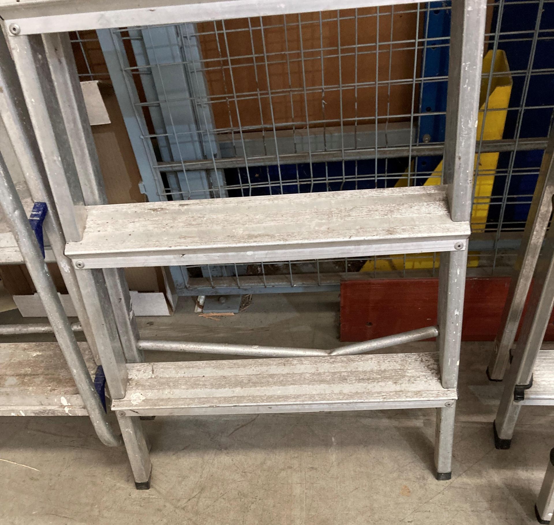 An aluminium seven-step step ladder - bottom rail bent (saleroom location: RD2) - Image 2 of 2