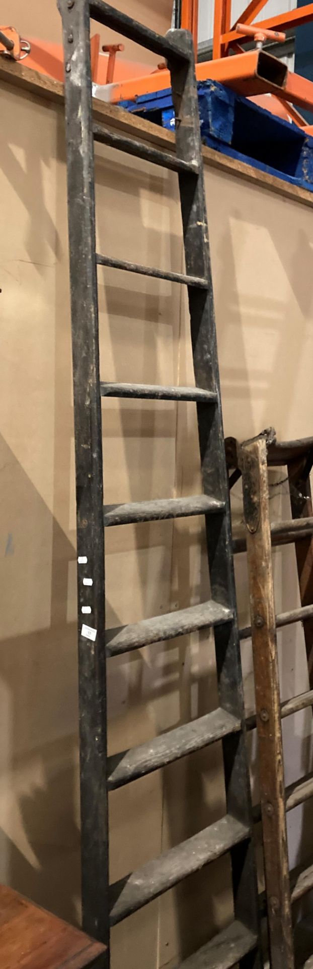 A ten-step wooden single ladder (saleroom location: MWR01)