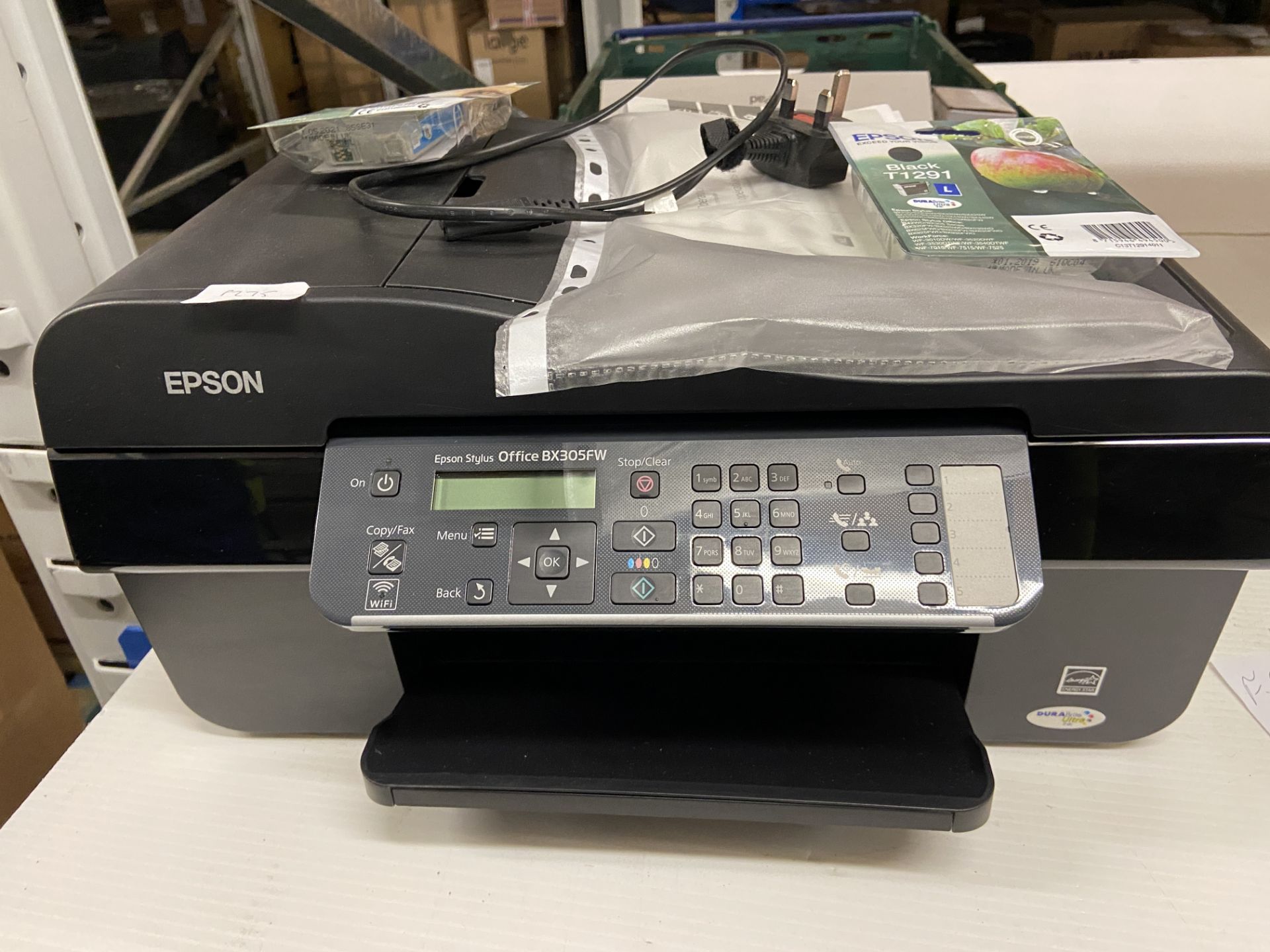 An Epson 305 all in one colour printer complete with manuals,