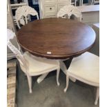 Oak topped circular dining table on white-painted base,