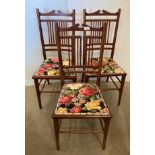 A set of three spindle back chairs with floral upholstery over woven seats (Saleroom location: MW