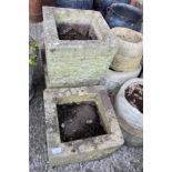 Three concrete square planters,