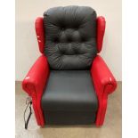 A red and black vinyl covered electric recliner armchair (Saleroom location: MS)