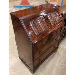 An Old Charm oak bureau with fall flap (plus key) over three drawer base,