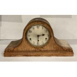 Light mahogany mantel clock with round face, five bell chime, made in Germany, no.