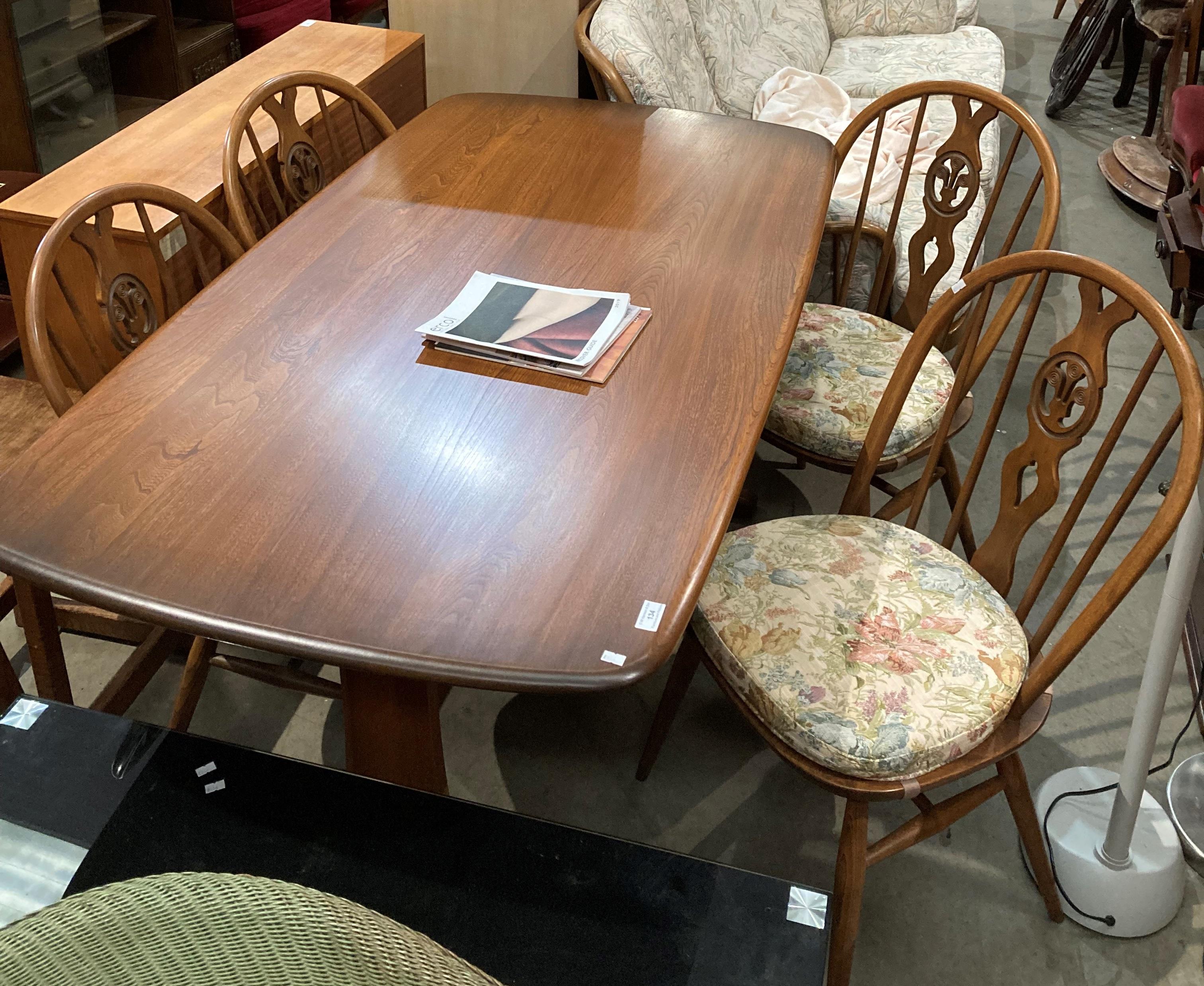 Ercol medium elm dining table,