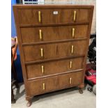 A walnut five drawer chest of drawers,