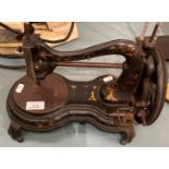 A late 19th century table top manual sewing machine (saleroom location: S3 T6)