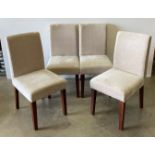 A set of four modern dining chairs with beige upholstery (Saleroom location: MS)