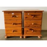 A pair of pine three drawer bedside cabinets, each 43cm x 43cm x 64.
