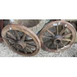 Pair of miniature ten spoke cart wheels with iron frames - each 45cm