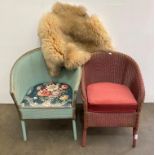 Two Lloyd Loom tub chairs and a Bradtrad lambskin rug,